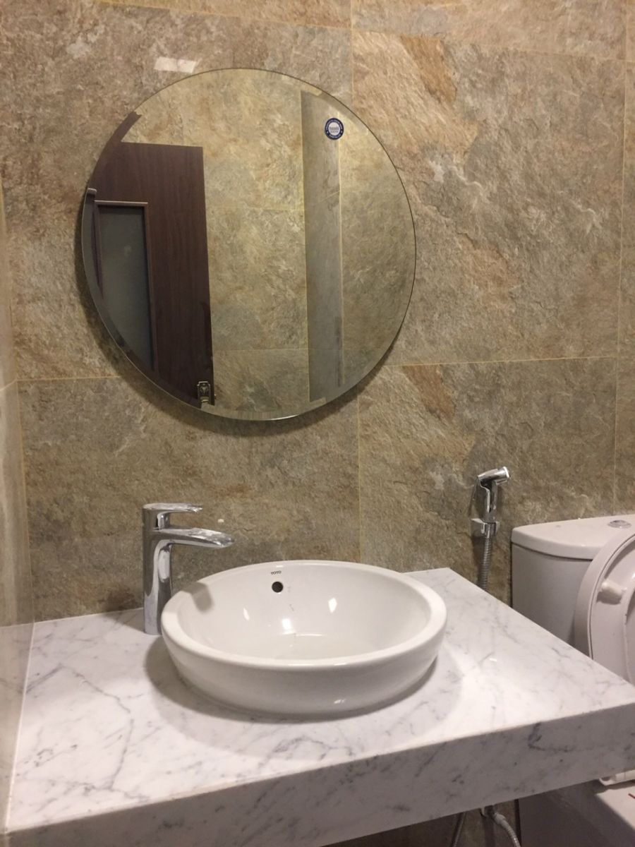 Gương tròn mài vát phòng tắm
